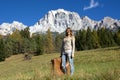 The woman traveling to the mountains, precisely in the Belluno Dolomites, towards Cortina D`ampezzo. Royalty Free Stock Photo