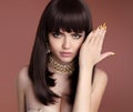 Beauty Vogue Hairstyle. Glamour girl closeup. Golden manicured n Royalty Free Stock Photo