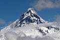 Beauty volcanic landscape: view on volcano above clouds