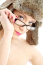 Beauty in winter hat and eyeglasses