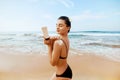 Beauty Woman applying sunscreen creme. Skin care. Body Sun protection sun cream. Royalty Free Stock Photo