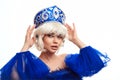 Beauty woman blond portrait. Fashion Russian girl model with hairstyle and kokoshnik Royalty Free Stock Photo