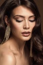 Beauty Woman Eyes Closed Makeup Portrait. Luxury Fashion Girl with Jewelry Earring. Woman Face Eye Shadow Cosmetic Make up and