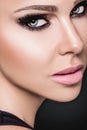 Beauty Woman Face. Closeup Of Beautiful Young Female Model With Soft Smooth Skin And Professional Facial Makeup. Beautiful woman Royalty Free Stock Photo