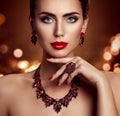 Beauty Woman Face Makeup And Jewelry, Fashion Model Portrait With Jewellery Over Shining Lights Background