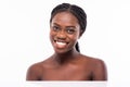 Beauty African Woman face Portrait. Beautiful Spa model Girl with Perfect Fresh Clean Skin. Brunette female looking at camera and Royalty Free Stock Photo