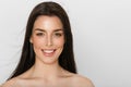 Beauty Woman face Portrait. Beautiful Spa model Girl with Perfect Fresh Clean Skin and brunette hair Royalty Free Stock Photo