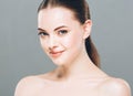 Beauty Woman face Portrait. Beautiful Spa model Girl with Perfect Fresh Clean Skin. Gray background Royalty Free Stock Photo