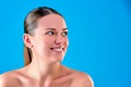 Beauty Woman face Portrait. Beautiful Spa model Girl smiles with Perfect Fresh Clean Skin. Brunette female looking at Royalty Free Stock Photo