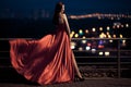 Beauty Woman In Fluttering Red Dress Outdoor Royalty Free Stock Photo