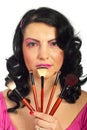 Beauty woman holding brushes set