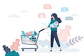 Beauty woman holding newborn baby and shopping trolley. Shopping for diapers and baby food