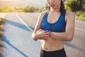 Beauty woman jogger ready to run set and looking at sports smart Royalty Free Stock Photo