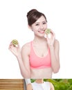 Beauty woman and Kiwi fruit