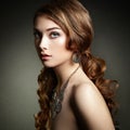 Beauty woman with long curly hair. Beautiful girl with elegant h Royalty Free Stock Photo
