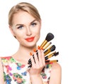 Beauty woman with makeup brushes Royalty Free Stock Photo