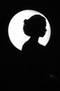 Woman monochrome silhouette over circle Royalty Free Stock Photo
