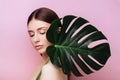Beauty Woman with natural green palm leaf Portrait Royalty Free Stock Photo