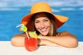 Beauty woman with perfect smile enjoying in a swimming pool on vacations Royalty Free Stock Photo