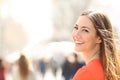 Beauty woman with perfect smile and white teeth on the street Royalty Free Stock Photo