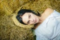 Beauty woman relax on hay grass Royalty Free Stock Photo