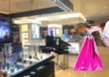 Beauty Woman with Shopping Bags in Shopping Mall. Shopper. Sales.