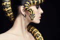 Beauty woman, snake, jewelry and make-up