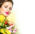 Beauty woman with spring flowers bouquet Royalty Free Stock Photo