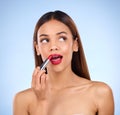 Beauty, woman thinking and red lipstick or makeup on face for cosmetics product in studio. Aesthetic female model on a Royalty Free Stock Photo