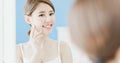 Beauty woman touch her face Royalty Free Stock Photo
