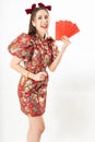 Beauty woman wear cheongsam and take Red envelopes in chinese new year Royalty Free Stock Photo