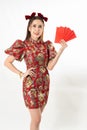 Beauty woman wear cheongsam and take Red envelopes in chinese new year Royalty Free Stock Photo