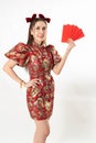 Beauty woman wear cheongsam and take Red envelopes in chinese new year Royalty Free Stock Photo