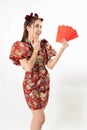 Beauty woman wear cheongsam and take Red envelopes in chinese new year