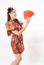 Beauty woman wear cheongsam and take Red envelopes in chinese new year Royalty Free Stock Photo