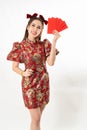 Beauty woman wear cheongsam and take Red envelopes in chinese new year Royalty Free Stock Photo