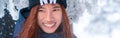 Beauty woman with winter fashion clothing with beautiful smile face in snow skii resort, closed up portrait