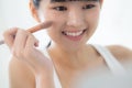 Beauty of young asian woman with learning makeup with brush on cheek on laptop computer with tutorial course online. Royalty Free Stock Photo