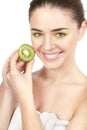 Beauty. Young beautiful woman holding kiwi Royalty Free Stock Photo