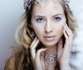 Beauty young snow queen in fairy flashes with hair Royalty Free Stock Photo