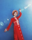 Beauty young vietnamese woman in red national ethnic costume Royalty Free Stock Photo