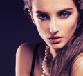 Beauty young woman with jewellery close up, luxury portrait of rich real girl, party makeup Royalty Free Stock Photo