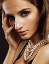 Beauty young woman with jewellery close up, luxury portrait of rich real girl, party makeup Royalty Free Stock Photo