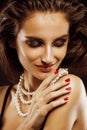 Beauty young woman with jewellery close up, luxury portrait of rich real girl, party makeup Royalty Free Stock Photo