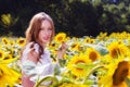 Beauty young woman in sunflower field Royalty Free Stock Photo