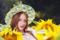 Beauty young woman in sunflower field Royalty Free Stock Photo