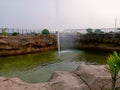 Beautyful fountain in a rock pond lion safari park etawah Royalty Free Stock Photo