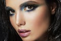 Beautyful girl with blue glitter on her face Royalty Free Stock Photo