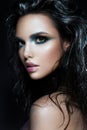 Beautyful girl with blue glitter on her face Royalty Free Stock Photo