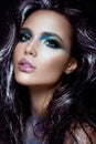 Beautyful girl with blue glitter on her face Royalty Free Stock Photo